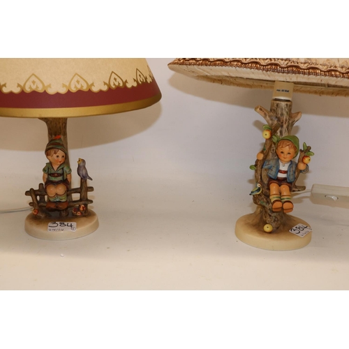 384 - Hummel Goebel, two table lamps, 'Apple Tree Boy' and 'Wayside Harmony'