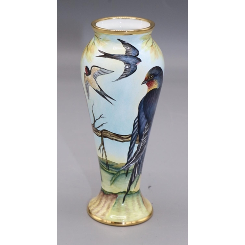 569 - Moorcroft Pottery: miniature enamel decorated vase, painted decoration of swallows above fields, H10... 