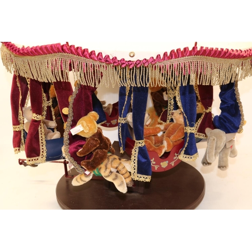 605 - Steiff: 'Millennium Carousel', revolving musical carousel with miniature teddy bears, H55cm