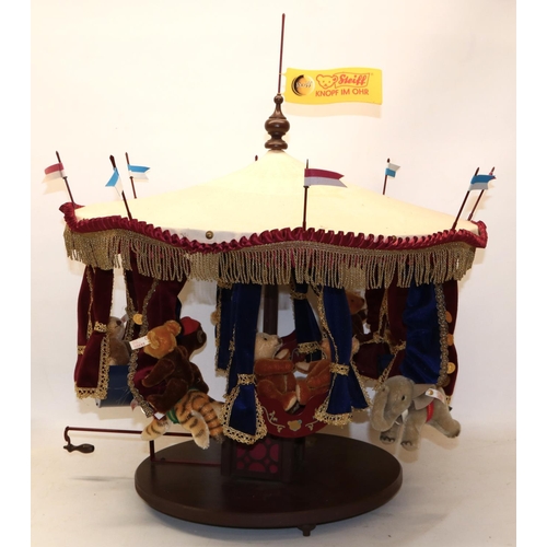 605 - Steiff: 'Millennium Carousel', revolving musical carousel with miniature teddy bears, H55cm