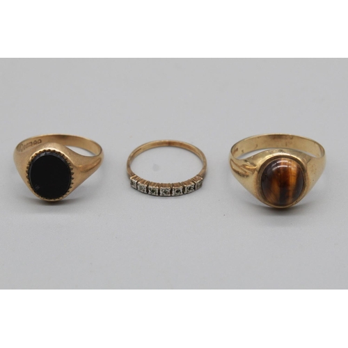 230 - 9ct gold ring set with tigers eye, 9ct ring set with black oval stone, 9ct gold half eternity ring w... 