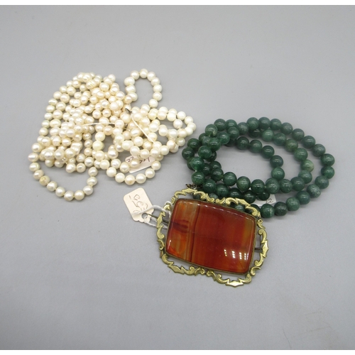 106 - Ornate yellow metal rectangular brooch set with large agate, a string of jade beads with white metal... 