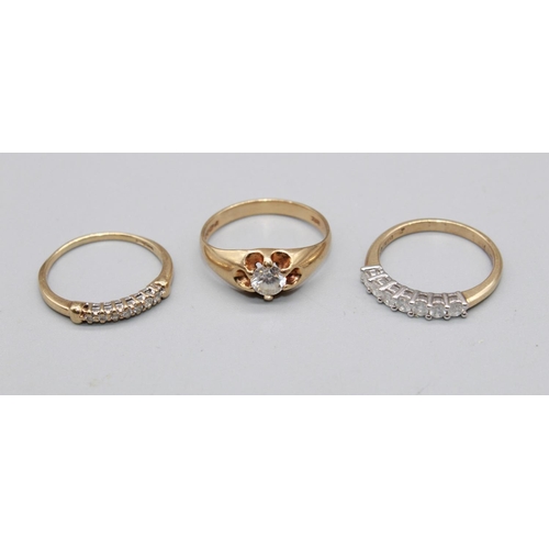 86 - 15ct yellow gold ring set with a row of diamonds, stamped 15, size P, 1.8g, a 9ct yellow gold ring s... 