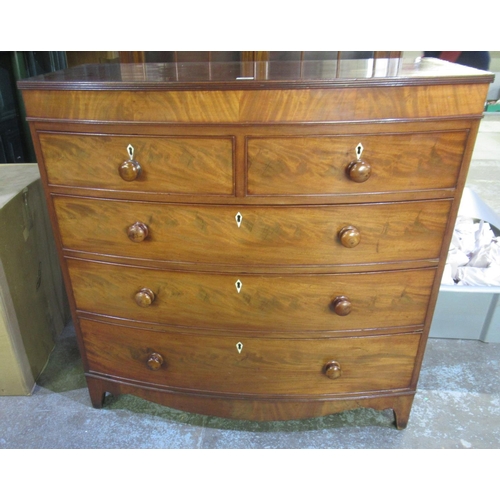 303 - 19th century mahogany bow front chest of two short and three long graduated drawers with turned wood... 