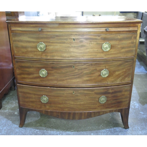 304 - Geo. IV mahogany bow front dressing chest with brushing slide and three long drawers on bracket feet... 