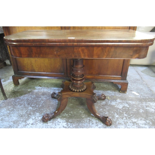 308 - Regency mahogany tea table, folding top on vase turned column and platform base with four paw feet, ... 