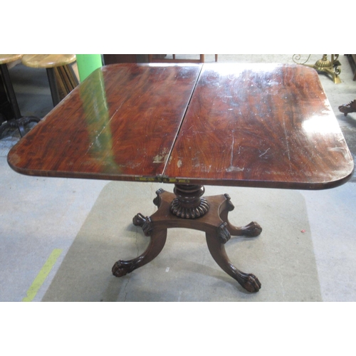 308 - Regency mahogany tea table, folding top on vase turned column and platform base with four paw feet, ... 