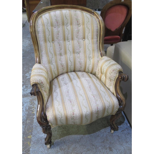 312 - Victorian rosewood framed upholstered arm chair, on scroll carved cabriole legs, H92cm