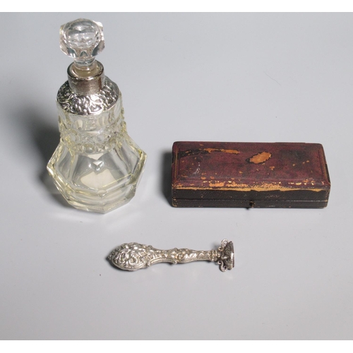 267 - 20th century hallmarked silver desk seal, in fitted case, H8cm, and a clear glass scent bottle and s... 