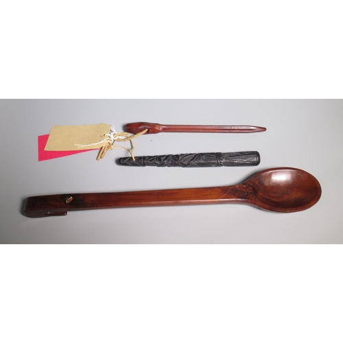 287 - Large carved yew spoon, Irish black oak fishing priest and a Sailmakers needle, L47cm max (3)