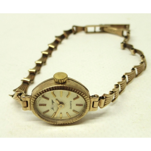 333 - Ladies Sovereign gold quartz wristwatch on matching bracelet, signed champagne dial with applied bat... 