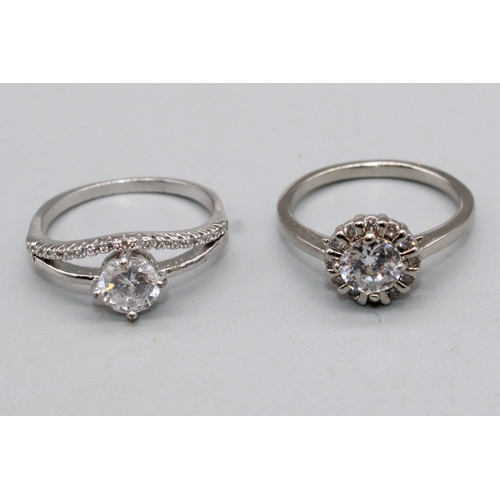 103 - white metal solitaire ring set with clear stone surrounded by a halo of clear stones, size N1/2, and... 