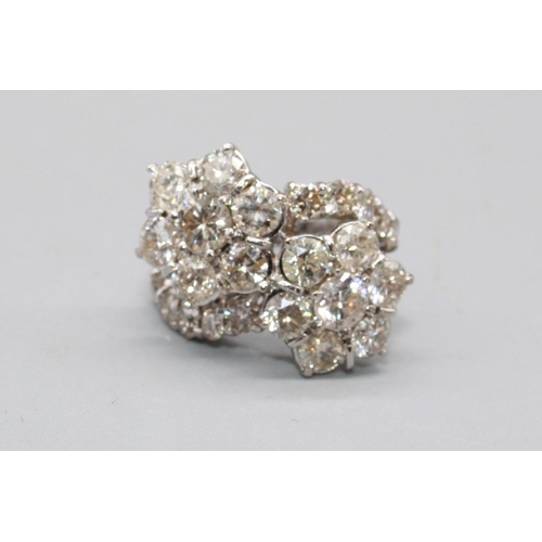 3 - 18ct white gold double shooting star cluster ring, each star set with seven brilliant cut diamonds i... 