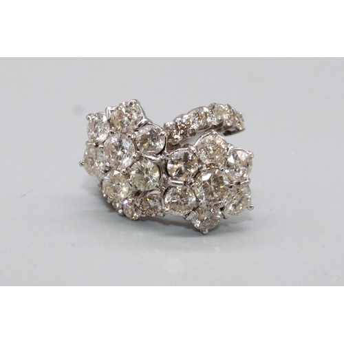 3 - 18ct white gold double shooting star cluster ring, each star set with seven brilliant cut diamonds i... 