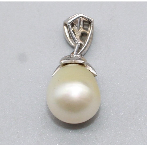 40 - 18ct white gold freshwater pearl drop necklace, the bail inlaid with baguette cut diamonds, the top ... 