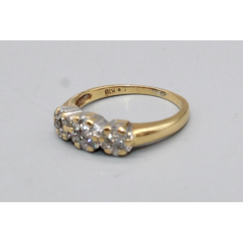 55 - 18ct yellow gold ring set with three diamond clusters, stamped 18, K1/2, 3.0g