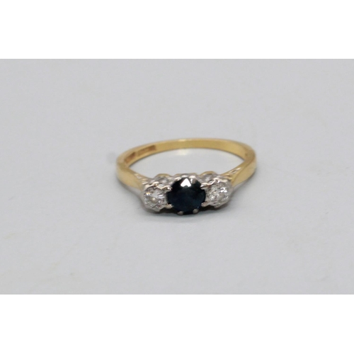 62 - 18ct yellow gold and platinum diamond and sapphire ring, the central sapphire flanked by diamonds, s... 