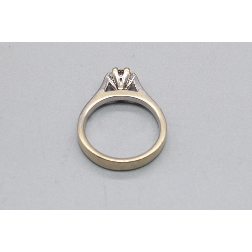 64 - 18ct white gold solitaire ring, set with brilliant cut diamond, approx. weight 0.37ct, stamped 750, ... 