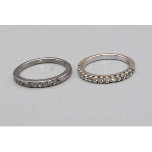 70 - Two 18ct white gold diamond set band rings, both stamped 18 or 750, size L1/2 and J1/2, 5.4g