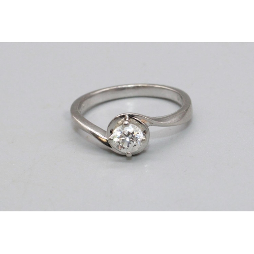 80 - Platinum diamond solitaire ring, the brilliant cut diamond in twist mount, diamond weight approx. 0.... 