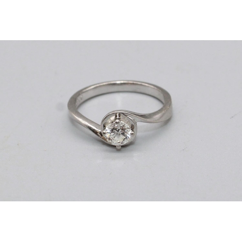 80 - Platinum diamond solitaire ring, the brilliant cut diamond in twist mount, diamond weight approx. 0.... 