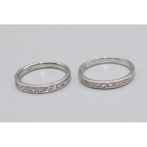 82 - Two 9ct white gold band rings, 1/3 set with diamonds, both stamped 9k, sizes O and N, 4.5g