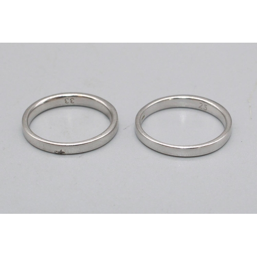 82 - Two 9ct white gold band rings, 1/3 set with diamonds, both stamped 9k, sizes O and N, 4.5g