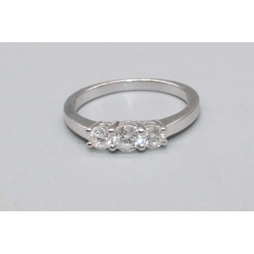 89 - 18ct white gold ring set with three brilliant cut diamonds, stamped 750, size M, 3.1g