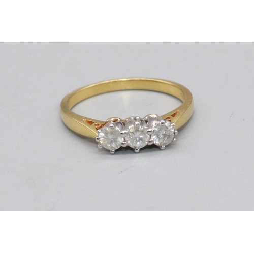 90 - 18ct yellow gold three stone diamond ring, stamped 18K, size O, 3.3g