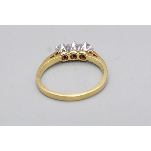 90 - 18ct yellow gold three stone diamond ring, stamped 18K, size O, 3.3g