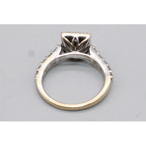 93 - 18ct white gold square faced ring set with brilliant cut diamonds, on diamond set shoulders, stamped... 