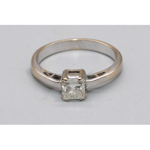 96 - 18ct white metal diamond solitaire ring, the square cut diamond in claw setting, approx. weight 0.41... 