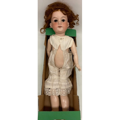 396 - Early 20th century Armand Marseille bisque head doll, curled wig, white undergarments, marked 390n/D... 