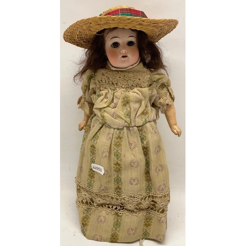 397 - Early 20th century Schoenau & Hoffmeister  bisque head doll, curled brown wig, Edwardian costume and... 