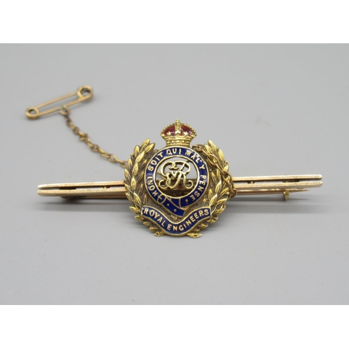 109 - 15ct gold and coloured enamel Royal Engineers sweetheart brooch, with safety chain, stamped 15ct