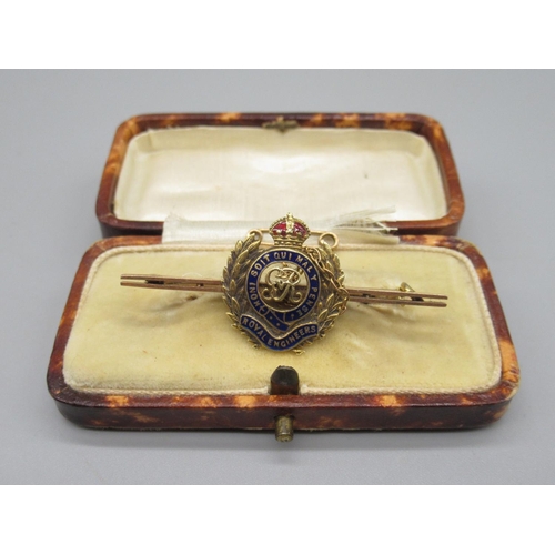 109 - 15ct gold and coloured enamel Royal Engineers sweetheart brooch, with safety chain, stamped 15ct