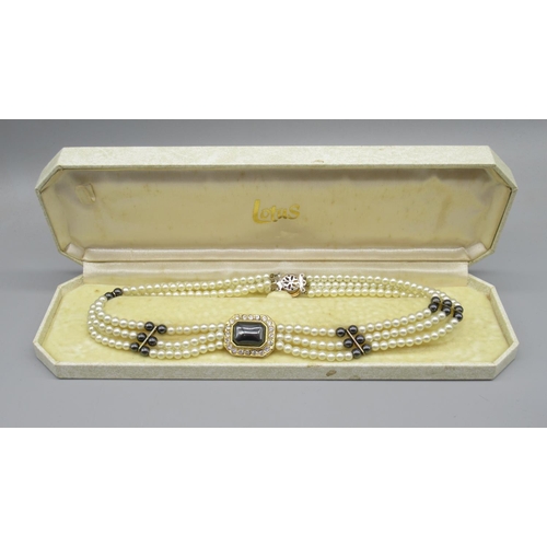 18 - Triple strand pearl necklace with yellow metal lozenge detail, and another single strand pearl neckl... 