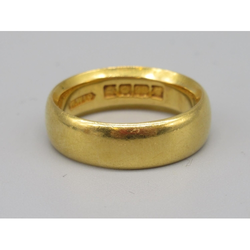 239 - 22ct yellow gold wedding band, stamped 22, size L1/2, 8.0g