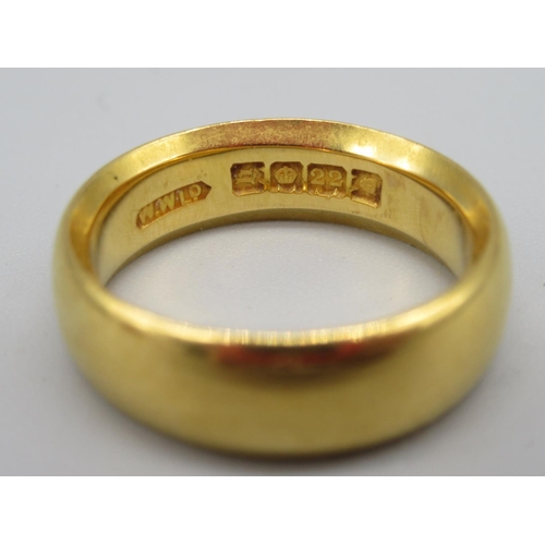 239 - 22ct yellow gold wedding band, stamped 22, size L1/2, 8.0g