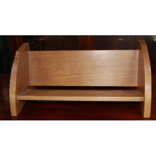 323B - Robert Mouseman Thompson of Kilburn - an oak book trough, single shelf with shaped ends, carved with... 