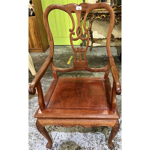 516 - C20th Chinese hardwood armchair with solid seat and carved detail