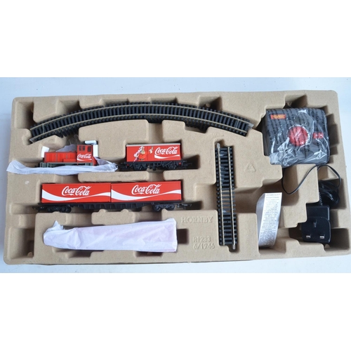 137 - Two Hornby OO gauge boxed train sets to include R1233 Christmas Train Set (contents in mint conditio... 