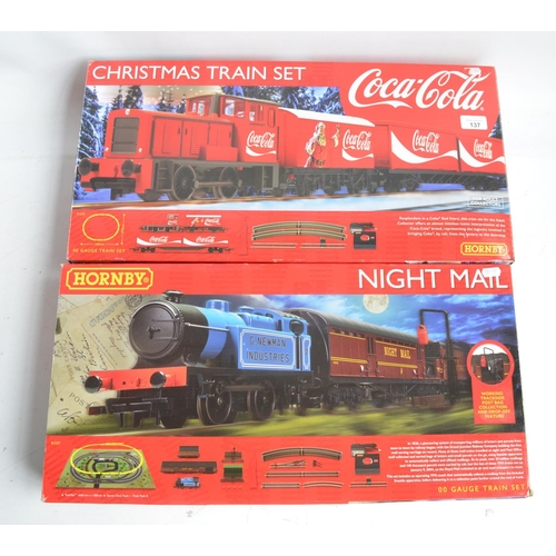 137 - Two Hornby OO gauge boxed train sets to include R1233 Christmas Train Set (contents in mint conditio... 