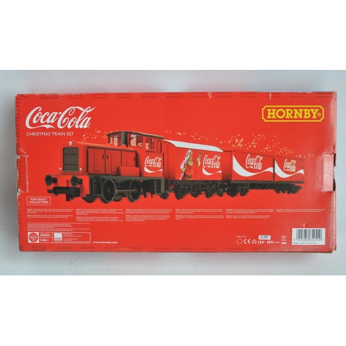 137 - Two Hornby OO gauge boxed train sets to include R1233 Christmas Train Set (contents in mint conditio... 