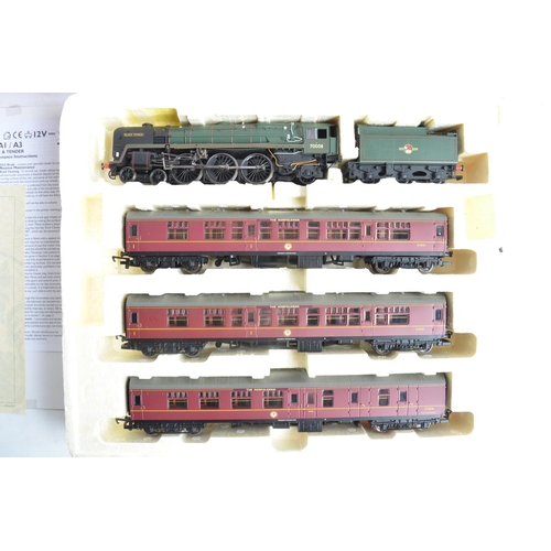 138 - Two limited edition Hornby OO gauge boxed train pack sets to include R2660M 'The Norfolkman' BR 4-6-... 