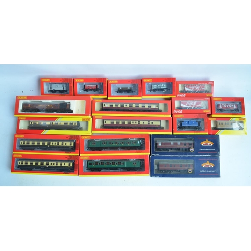 143 - Collection of boxed OO gauge passenger coach and goods wagons from Hornby and Bachmann to include Ho... 