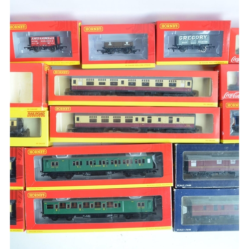 143 - Collection of boxed OO gauge passenger coach and goods wagons from Hornby and Bachmann to include Ho... 