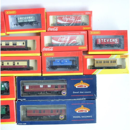 143 - Collection of boxed OO gauge passenger coach and goods wagons from Hornby and Bachmann to include Ho... 