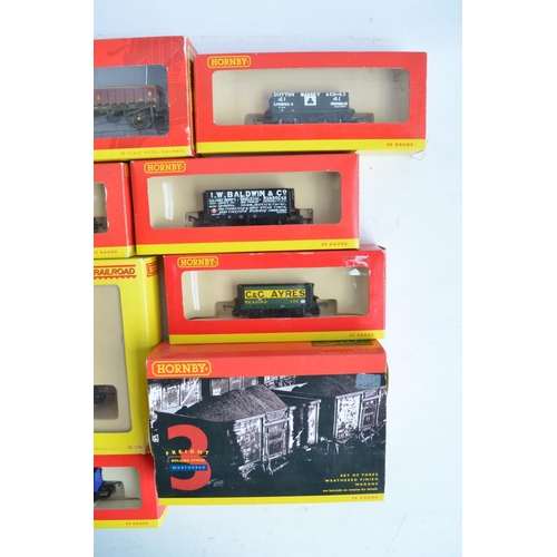 145 - Collection of boxed OO gauge goods wagons and multi wagon sets from Hornby to include R6332A 3x Proc... 