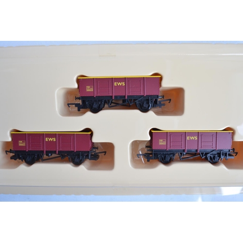 145 - Collection of boxed OO gauge goods wagons and multi wagon sets from Hornby to include R6332A 3x Proc... 